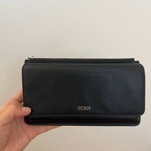 Black leather Tumi wallet crossbody